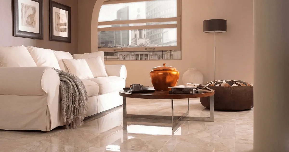 Modern living room with professionally installed marble flooring, a beige sofa, coffee table in Tacoma, WA